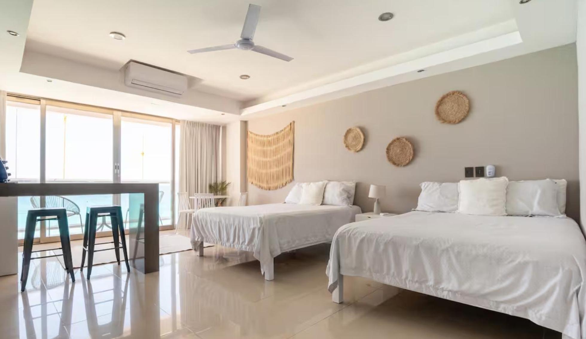 *turquoise Escape- Beachfront By Casa Paraiso* Apartment *